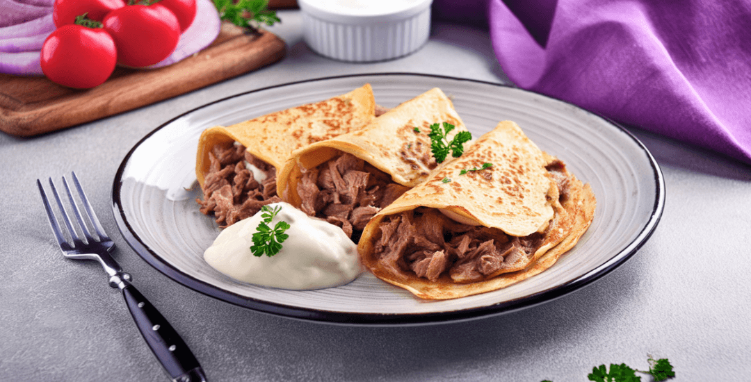 Crepes de carne y crema de leche